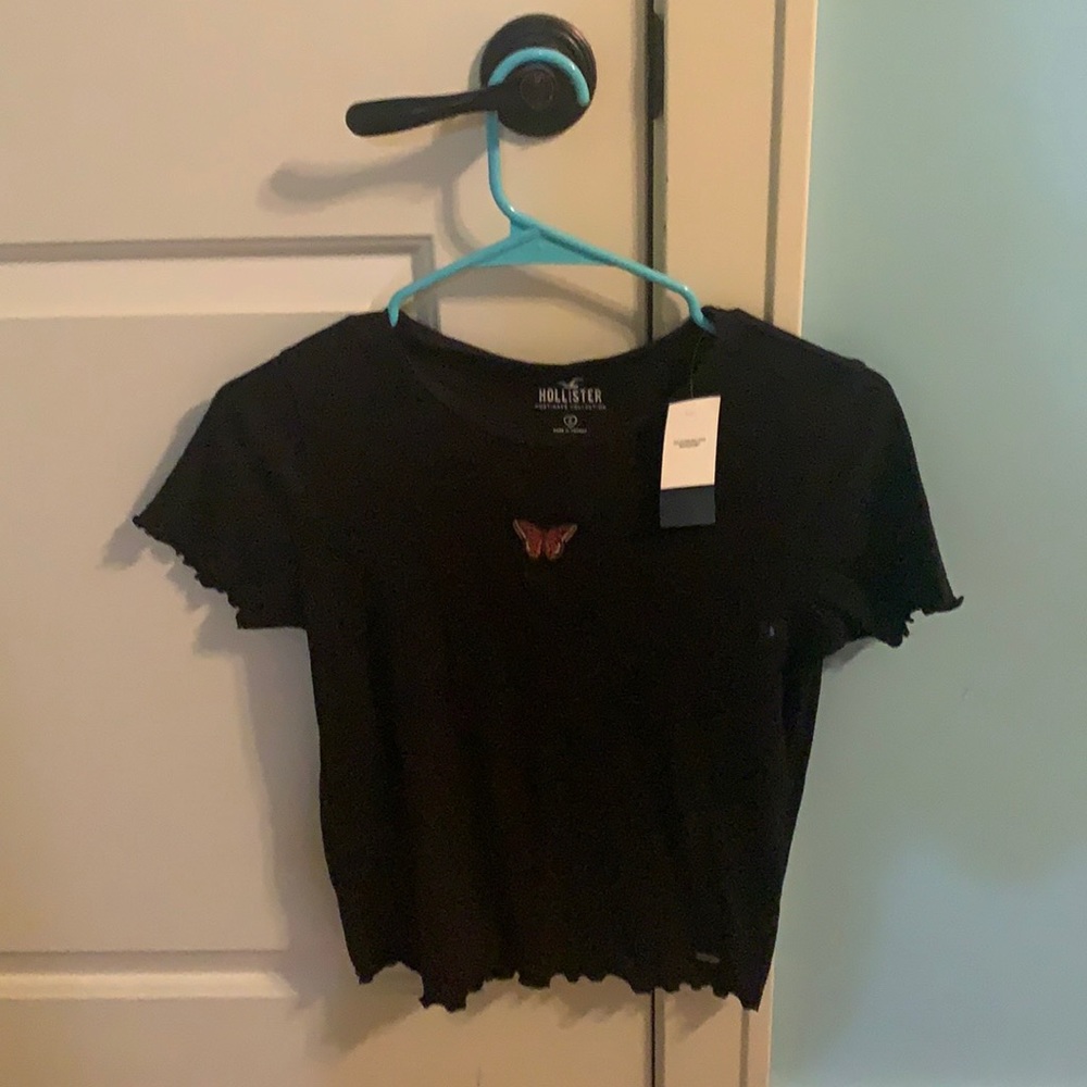 Black, short sleeve new with tag